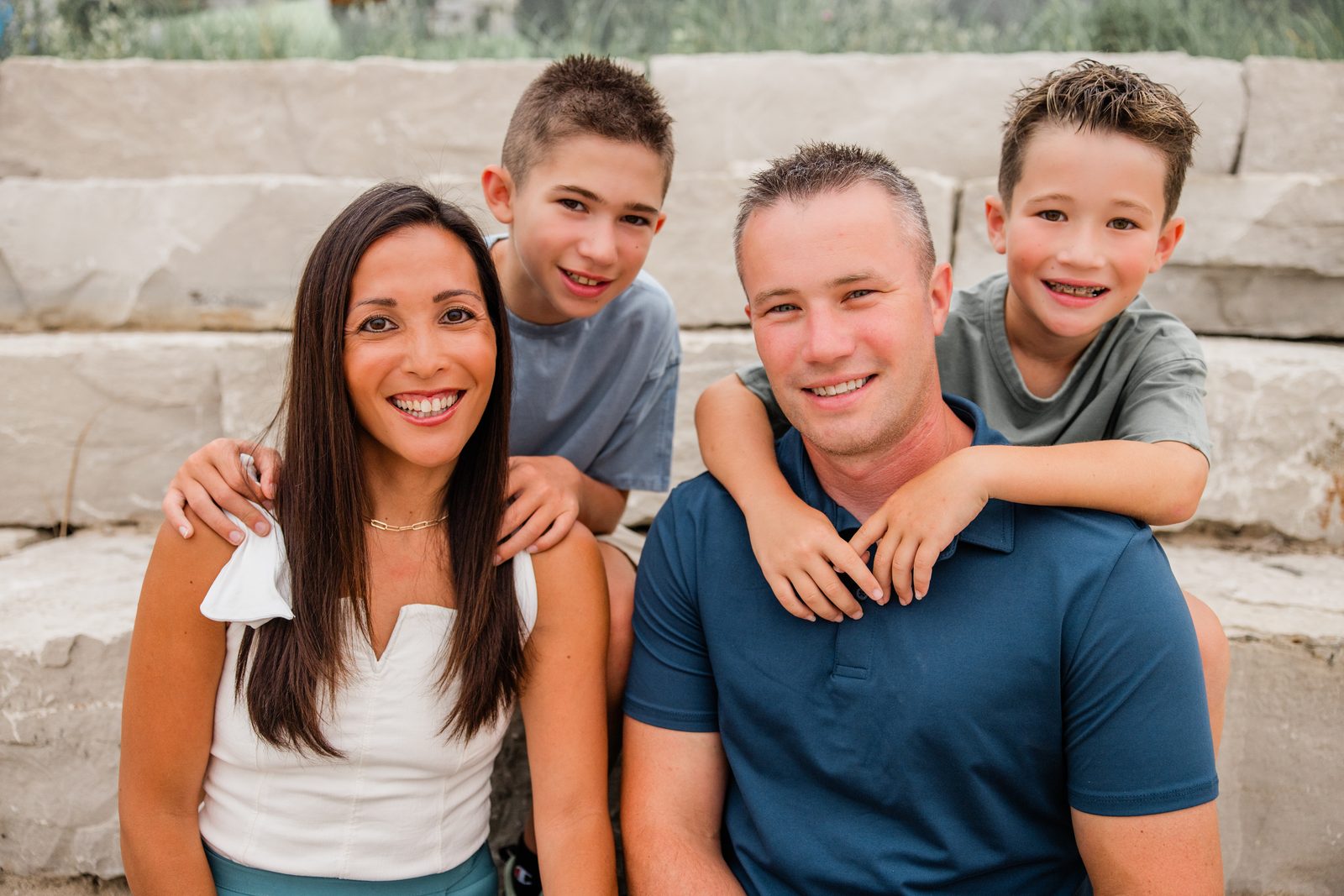 Lauren with her husband and two boys