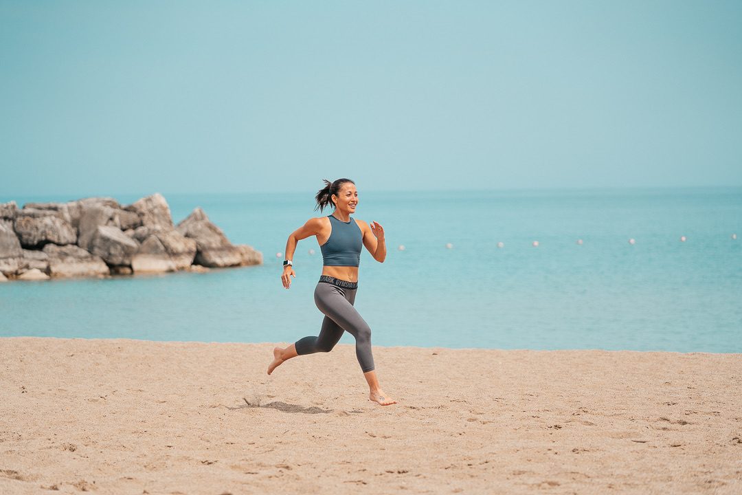 Lauren running on the beach